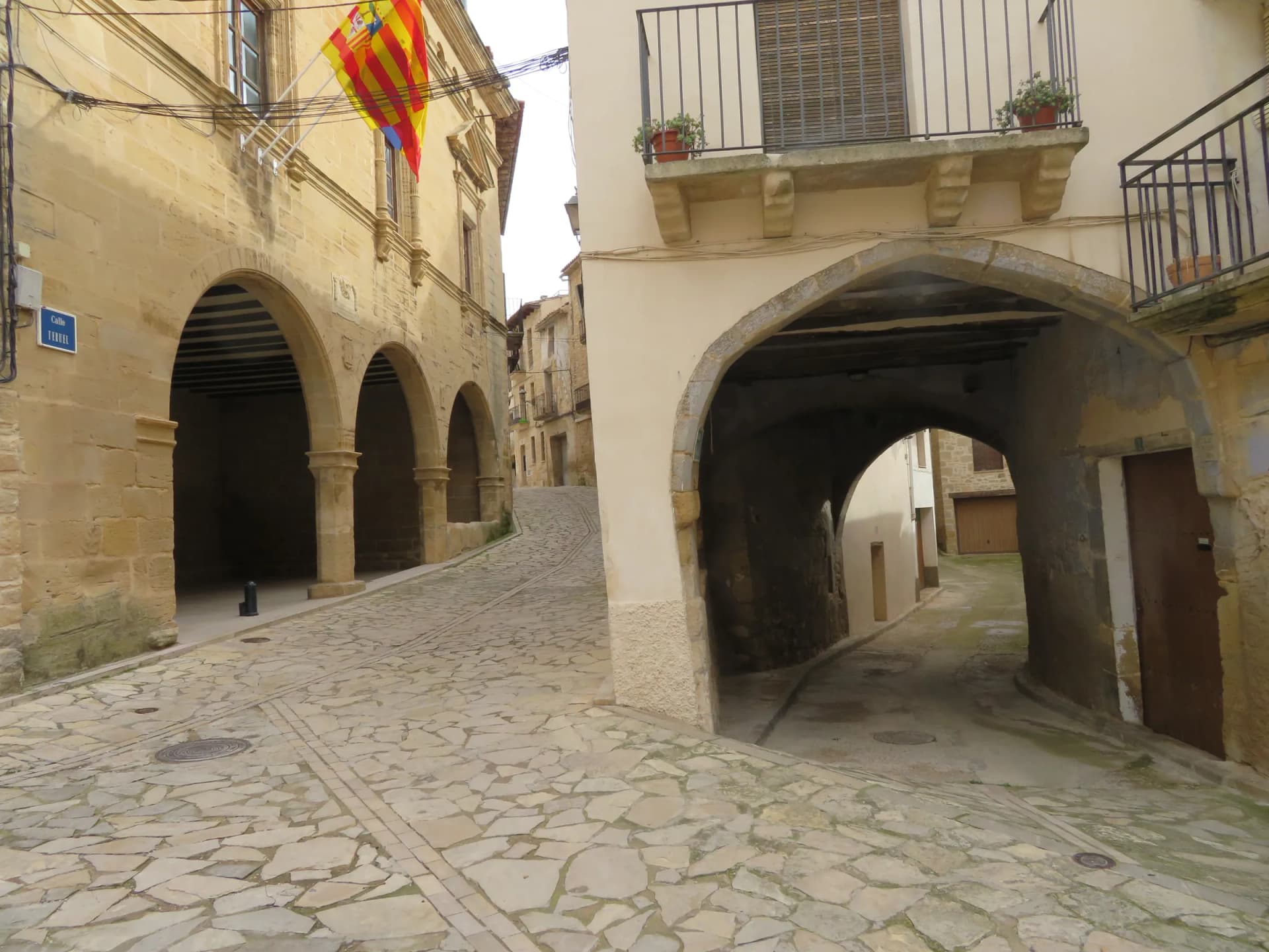 The stone arcades of a street in Calaceite