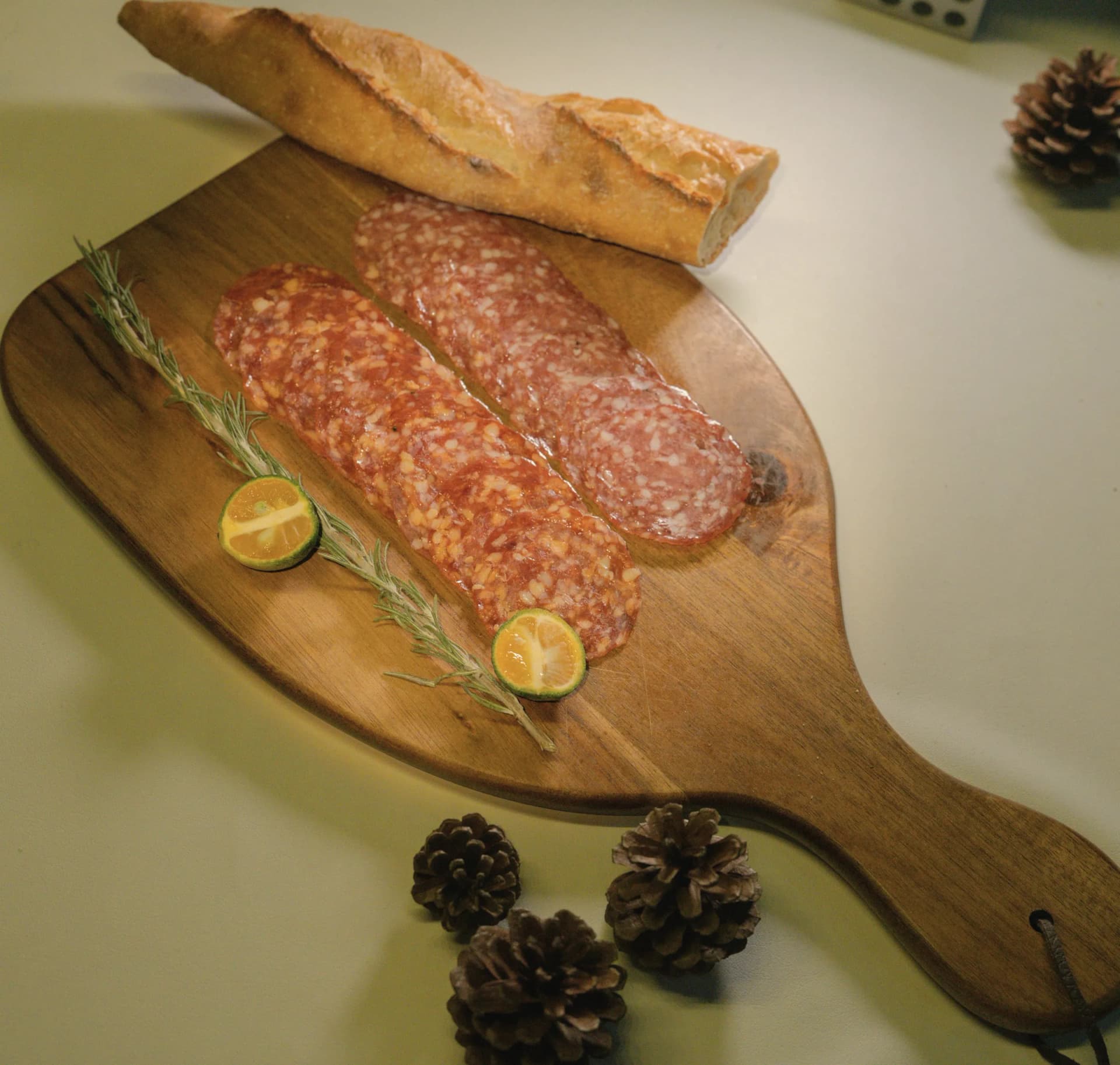 Sliced salchichón on a wooden board